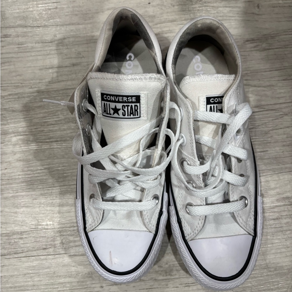 Never worn. Small mark from storage.